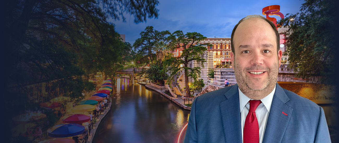 Robert Almonte II with the San Antonio river in the background